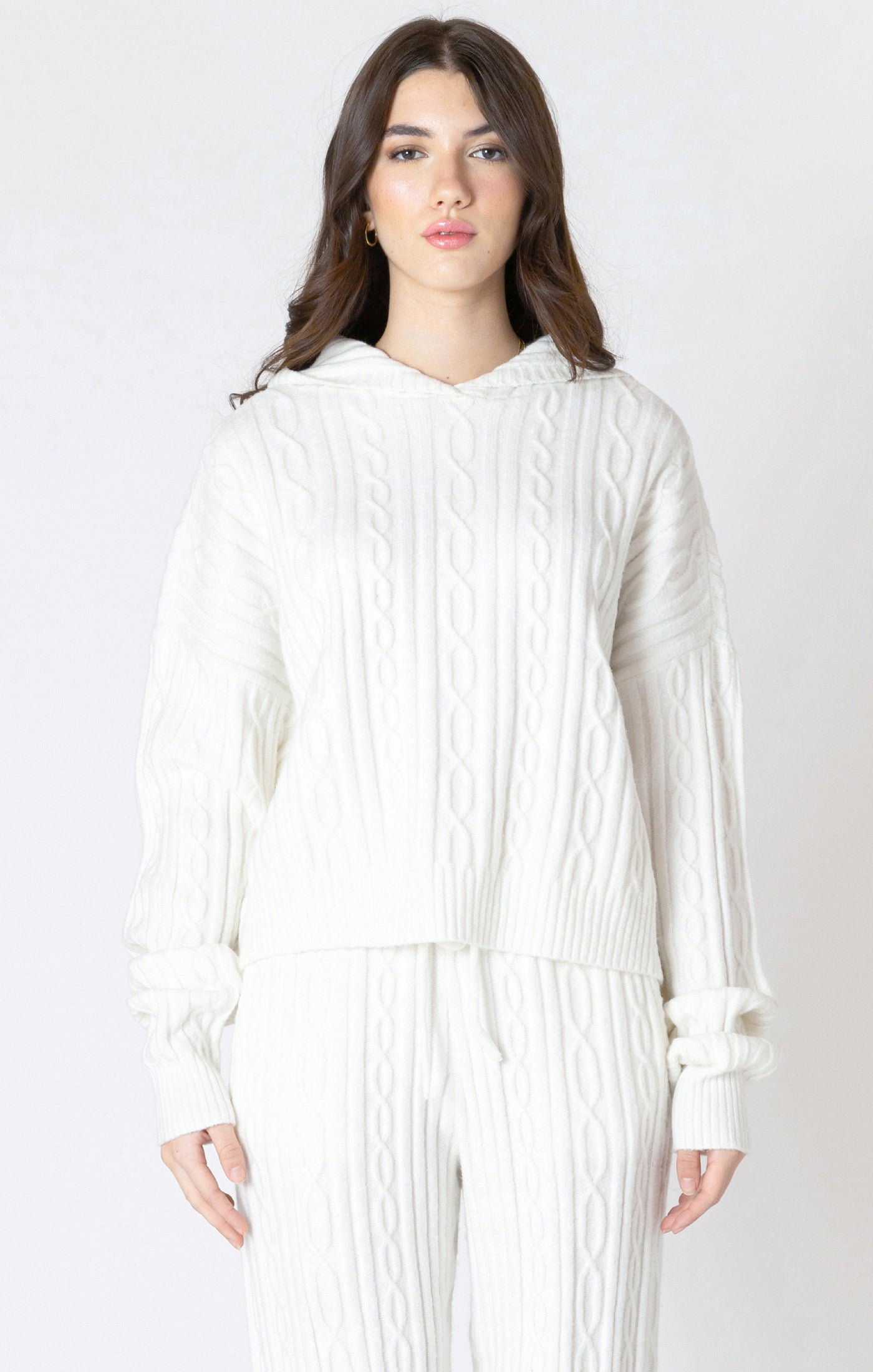Women's hooded cable knit sweater